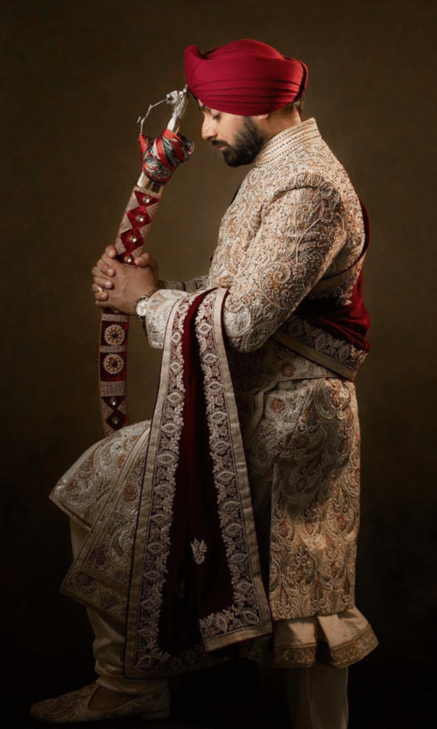 Groom in Maharaja Sherwani getting ready for anand karaj