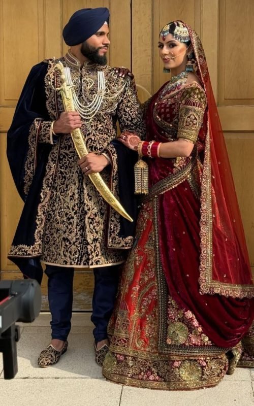 Couple in Sherwani and Lehenga